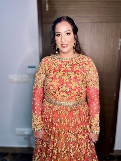 All set for a Lohri function. I created an effortlessly beautiful and classy look for her, with a focus on radiant skin and a bold lip.