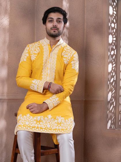 A final look at the beautifully embroidered zesty yellow kurta.