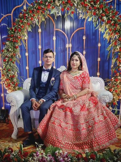 A beautiful portrait of a couple on their reception stage. I work with couples to build their confidence so they feel like stars, ready for their big performance and all the photos that come with it.