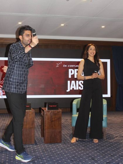 Having a bit of fun on stage during the TEDx event. Spontaneous, light-hearted moments make any event more memorable.