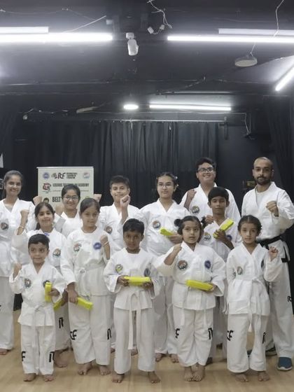 A group photo of all the students who successfully passed their belt grading, conducted by Bo-Sabum Shailesh Maurya and Bo-Sabum Arka Mandal.