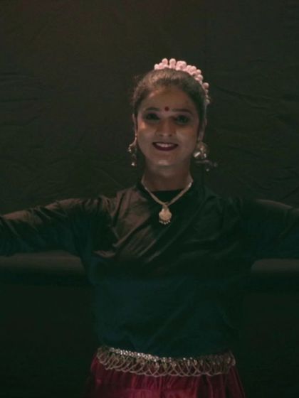 A joyful, forward-facing portrait from our Navratri 'Shakti' celebration. This shot shows the happiness and confidence that comes from performing and celebrating our culture together.