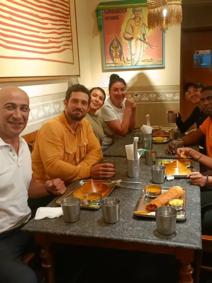 After a ride full of chaos, colors, and calmness, there's nothing better than sharing a meal together. Here, our group enjoys some delicious South Indian food after the Nizamuddin tour.