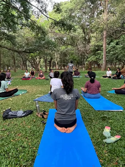 A view from the back during our yoga session in Cubbon Park. There's a special energy when we all practice together outdoors, surrounded by nature.
