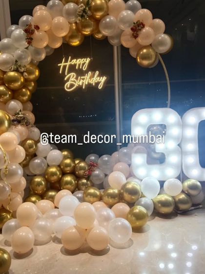 A beautifully lit shot of the 30th birthday decor, highlighting the warm glow and celebratory atmosphere.