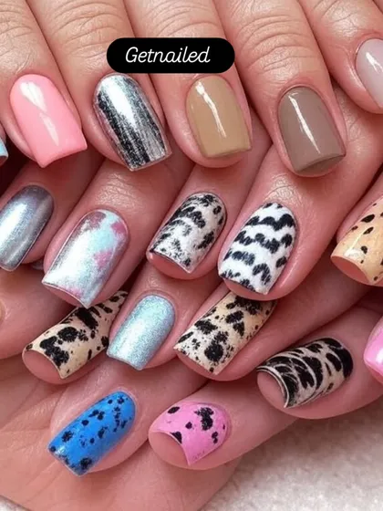 Our courses cover a wide variety of nail art styles. Here you can see a sampler of techniques we teach, including animal prints, chrome effects, and solid color application, ensuring you can cater to any client request.