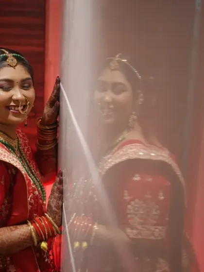 A creative bridal portrait using a sheer curtain to create a soft, dreamy effect. I love experimenting with different techniques to produce unique and artistic photos.