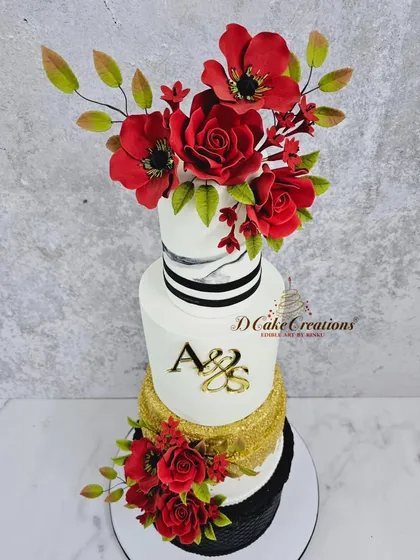 A slightly different angle of the five-tier modern wedding cake, emphasizing the height and the dynamic arrangement of the sugar flowers.