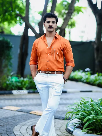 An outdoor shot of Rohit, showcasing how the makeup looks flawless even in natural daylight.