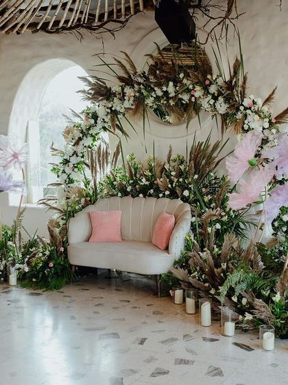 A wider view of the boho-chic stage, showing how the natural elements and soft lighting create a warm and inviting atmosphere.