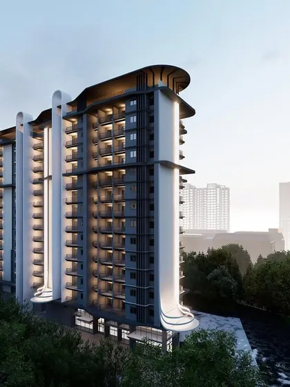 In designing this apartment facade in Mangalore, I used clean vertical fins and curved forms to create a dynamic play of light and shadow. The design balances modern aesthetics with functional elegance, giving the urban structure a refined and cohesive identity.