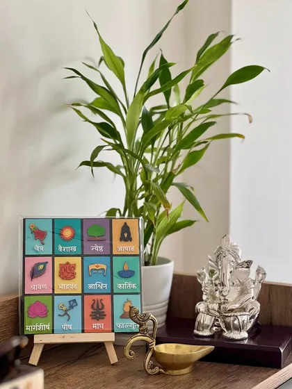 Another client shared this photo of the Marathi month calendar displayed on an easel in their puja corner, next to a silver Ganesh idol. It fits so perfectly.