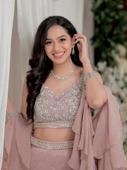 A happy and glowing client on her engagement day. The minimal makeup approach ensures her natural beauty is the main focus.
