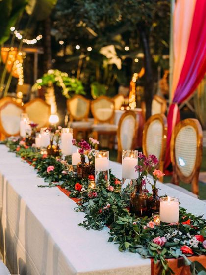 The perfect setting for a pre-wedding cocktail party or sangeet night. The lawn provides ample space for a dance floor, while the surrounding trees, lit with elegant chandeliers and string lights, create a festive and celebratory atmosphere.