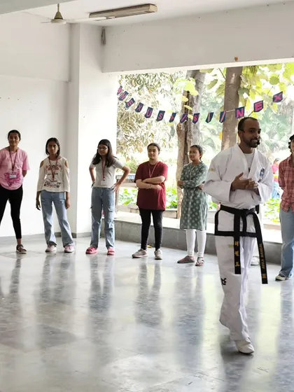 I am demonstrating proper stance and movement to students at LSR College. A strong foundation is critical for effective self-defense, helping maintain balance and generate power.