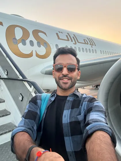 A birthday selfie with an Emirates flight on my way to an event in Tanzania. Traveling the world for work is a dream come true, and I'm grateful for every opportunity.