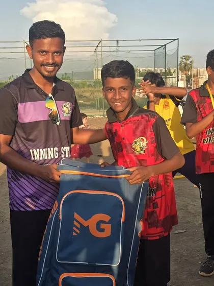 Our player receiving the Most Valuable Player (MVP) award for his outstanding all-round performance in the tournament.