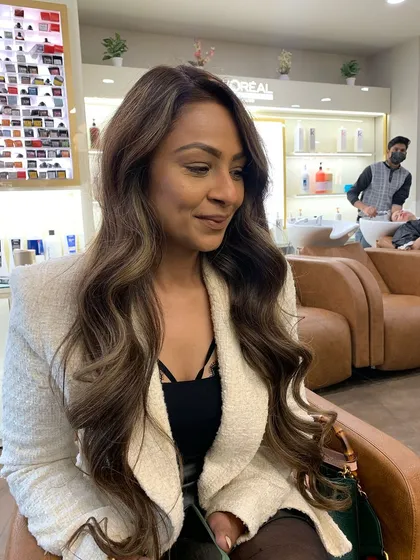 Another beautiful shot of this trending ash brown hair color. The look is sophisticated and modern.