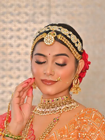 A close-up on the bride's soft and shimmery eye makeup. The look is elegant and timeless, perfect for a bride who wants to look effortlessly beautiful.