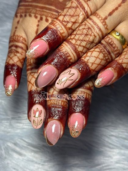 A full view of this stunning bridal set, showing the personalized initial, lotus flower, and other glamorous details.