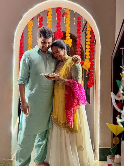 A candid, romantic moment with my husband during our Diwali celebration. This photo adds another dimension to my festive content, showing the couple's bond amidst the family festivities.