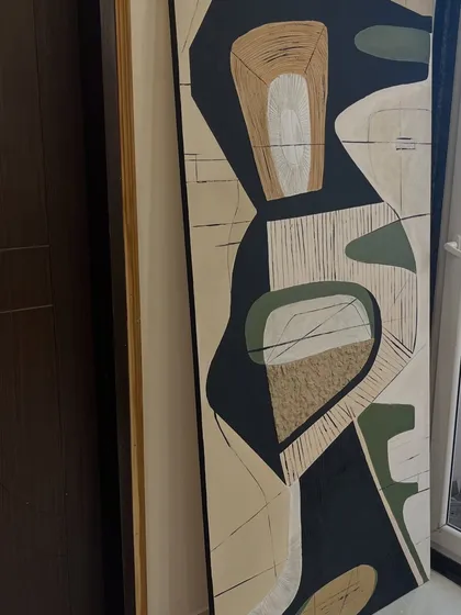 A detail shot of the custom abstract piece, highlighting the line work and textured elements. These subtle details add depth and invite a closer look.