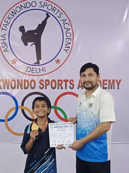 One of our talented students proudly displays his gold medal and certificate from the Delhi Games 2025. Each win is a step forward in their martial arts journey.