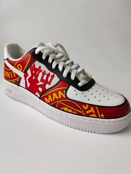 GGMU! I wanted to go big and bold for this Manchester United custom sneaker. I painted a gradient red base and then layered the iconic logos and text on top for a powerful design.
