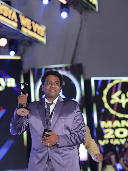Another happy moment from the award ceremony, celebrating the hard work and dedication of our team.