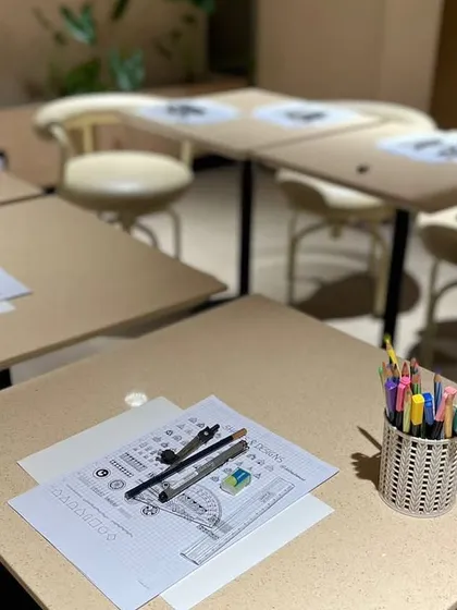 The setup is ready. Before every workshop, I ensure each station is perfectly arranged with all the art materials needed for a smooth and enjoyable experience.