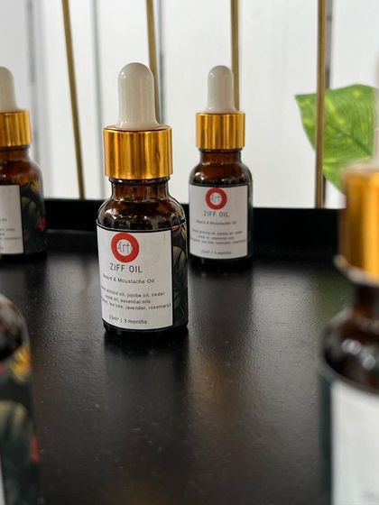 A closer look at my face oil bottles, ready for my pop-up shop. Each one is carefully labeled and filled with my special blend of healing oils.