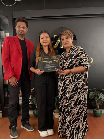 Celebrating the success of another graduate.