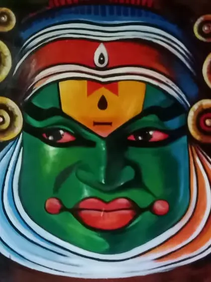 This is a vibrant acrylic painting of a Kathakali mask, a powerful symbol of Indian classical performance art. I focused on the intense colors and dramatic expression to capture the character's divine and heroic essence, making it a striking piece of cultural art.