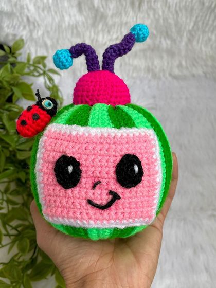 The Cocomelon logo as a plushie! This was a fun and unique request, with the watermelon TV and ladybug friend. The stripes were a challenge, but I love the final result.