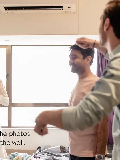 These aren't the photos you frame on the wall, but they are the ones that bring back the real memories. A friend helping the groom get ready is a perfect example of the unscripted support system on a wedding day.