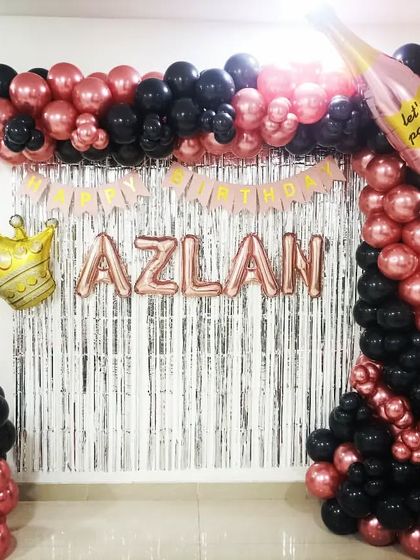 Another angle of the stylish rose gold and black home setup.