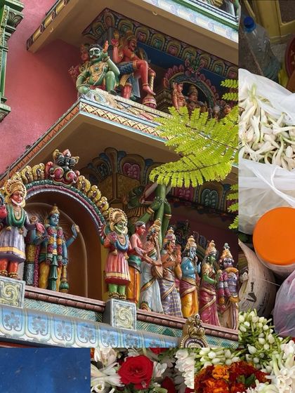 The colorful gopuram of a Matunga temple, with a market scene of fresh jasmine flowers in the foreground.