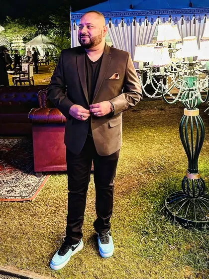 Limits only exist in your mind. A confident pose at an outdoor event, ready to take on the night.