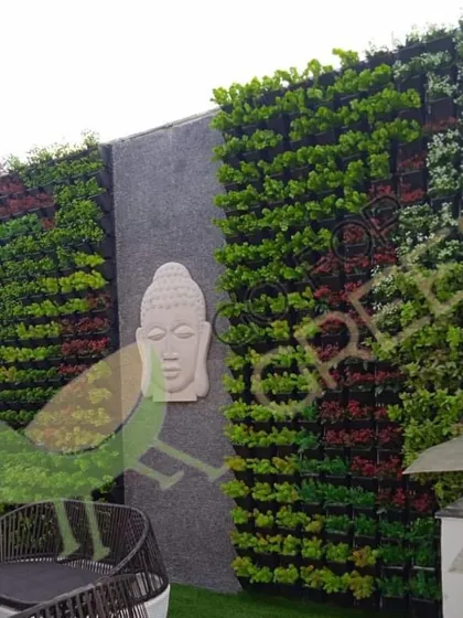 Turn a plain wall into a stunning masterpiece with my artificial vertical gardens. This client's terrace now features a serene, vibrant green wall that provides a beautiful backdrop for their seating area. These UV-protected mats ensure the colors stay rich and true, with absolutely no maintenance needed.