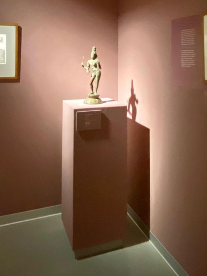 A corner in one of the galleries at the Museum of Art and Photography (MAP), where focused lighting highlights a single sculpture. This demonstrates our approach to creating carefully controlled environments that enhance the viewing of art.