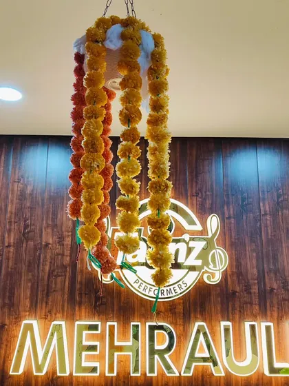 Simple and traditional decorations like these marigold garlands add a beautiful touch to our studio during Indian festivals.