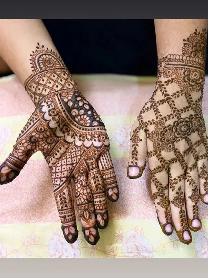 A back-hand design showing two different approaches: one with a dense, traditional pattern and the other with a lighter, spaced-out floral net.