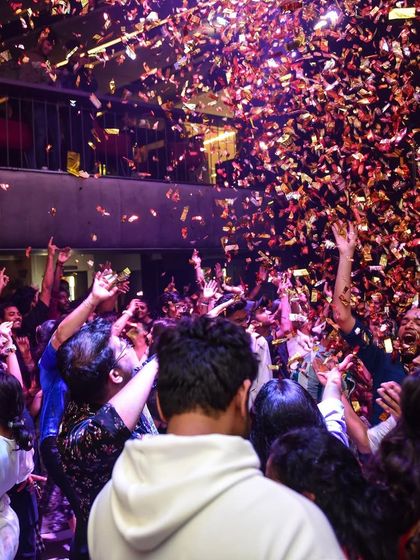 A massive gold confetti drop, creating a spectacular moment of celebration.