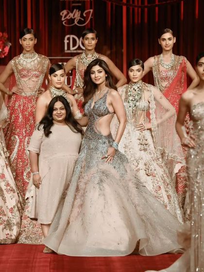 Another angle of the grand finale at India Couture Week, with Shilpa Shetty at the center. This shot shows the scale and opulence of the entire collection.