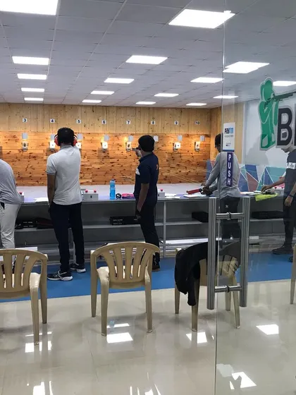 Our range is a place of intense focus. Here, shooters are practicing their pistol and rifle techniques side by side.