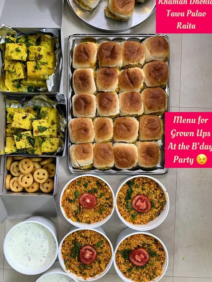 Another view of the adult's menu at a birthday party, with smiley fries for a touch of fun.