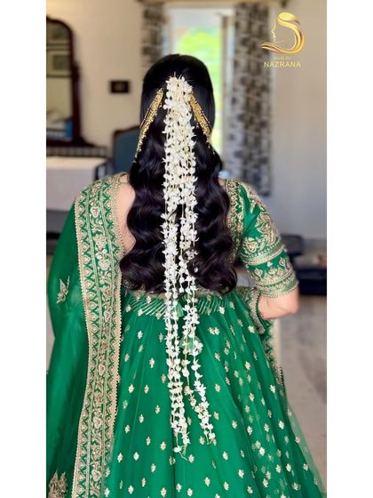 A close-up of the gajra and waves, a beautiful combination of traditional and modern.