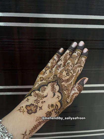 A pretty and delicate design for Eid, featuring a mix of floral and bird motifs with plenty of negative space.