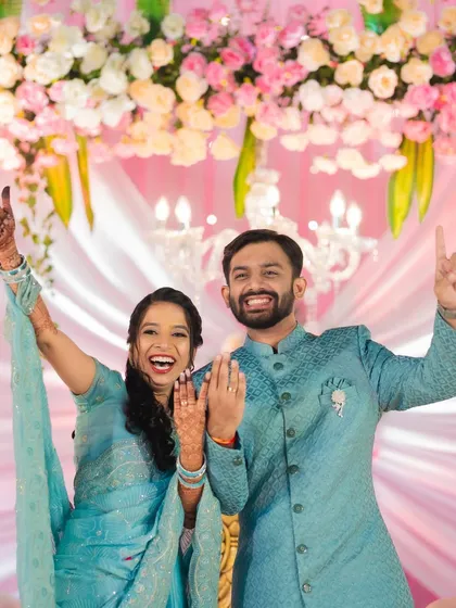 Pure celebration. Varad and Dr. Rutuja cheer after their ring exchange, a moment of pure, unscripted happiness that I love to capture.