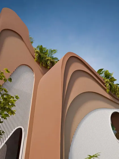 Another detail of the upper facade, showing the organic, wave-like forms.